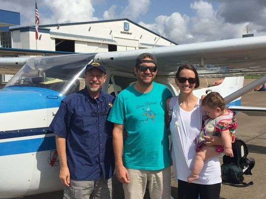 A Hobby That Helps Those in Need, Pilot Mark Blair (left) with Patient Avery Benjamin (infant) and parents Christopher and Abbey Benjamin. (Photo: Mark Blair) Pilots for Patients: A Hobby That Helps Those in Need