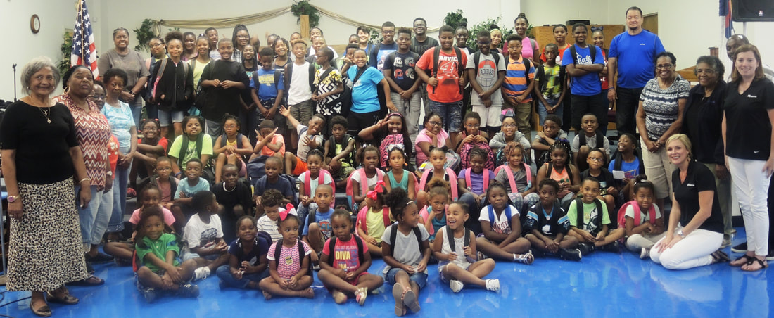 Rubicon Gives Back With Backpacks, TCA Group photo